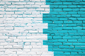 white and turquoise brick wall with a teal shade in t
