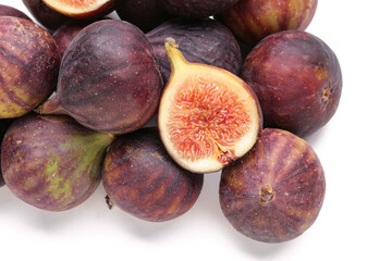 Fresh ripe figs on white background