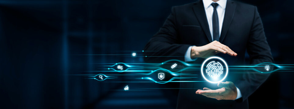 Biometric Security, Businessman Holding Biometric Security icon, Identity Verification, Access Control, Authentication on Dark Background.