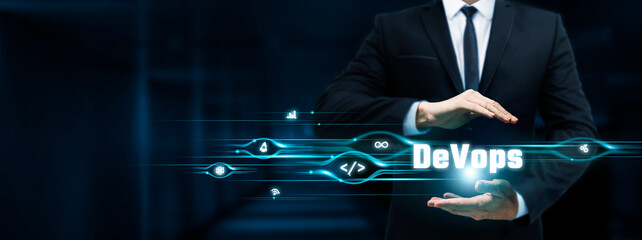 DevOps, Businessman Holding DevOps icon, Continuous Integration, Automation, Collaboration on Dark...