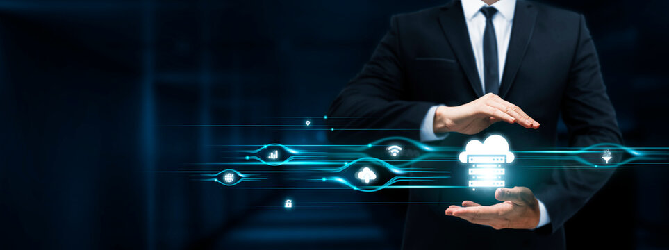 Hosting Telecommunications Services, Businessman Holding Hosting icon, Data Centers, Cloud Infrastructure, Network Management on Dark Background.