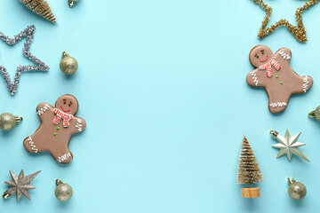 Gingerbread cookies with Christmas decor on blue background