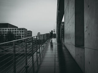 Person on a concrete bridge in Berlin
