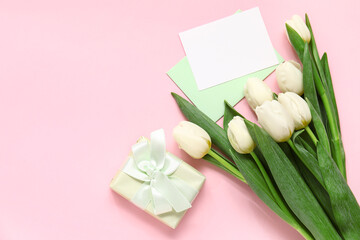 Blank cards with gift box and white tulips on pink background