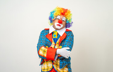 Mr Clown. Portrait of sadness face Clown man in colorful uniform standing crying feeling sad...