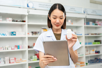 Professional Pharmacist woman in uniform holding medicine bottle talks to patient via online video conferencing advice to customers standing near drug shelves counter. Pharmacist inventory medicine