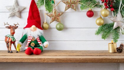 Fototapeta na wymiar christmas elf toy on an white background with copy space christmas spirit christmas shelf tradition