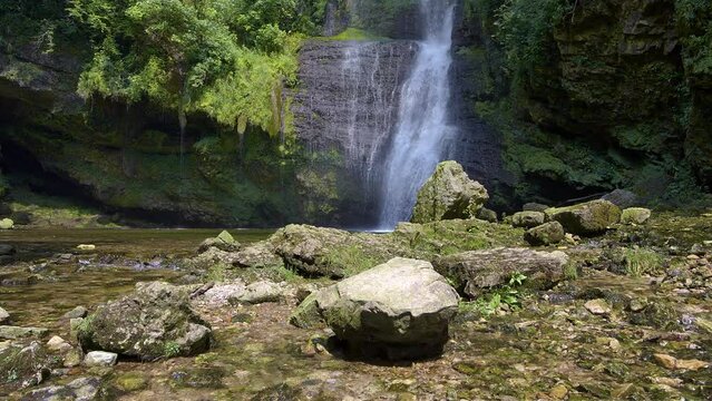 Summer landscape on the Ferrera waterfalls in Italy.