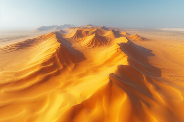 Fototapeta na wymiar A drone perspective of a desert landscape, showcasing the vastness and unique patterns of sand dunes stretching into the horizon. Concept of aerial desert exploration. Generative Ai.