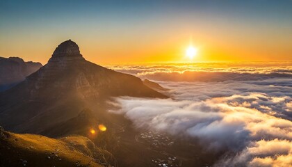 golden sunset above clouds mountain view table mountain south africa - obrazy, fototapety, plakaty