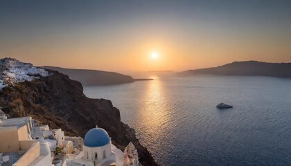 sun rising over a quiet beautiful mediterranean sea in santorini greek islands