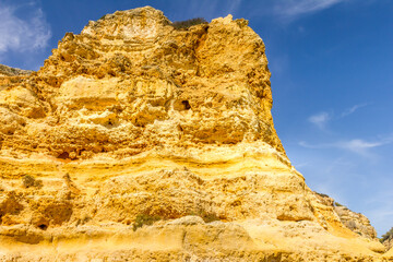 Cliffs and caves in Benagil, Algarve, Portugal - 731273522