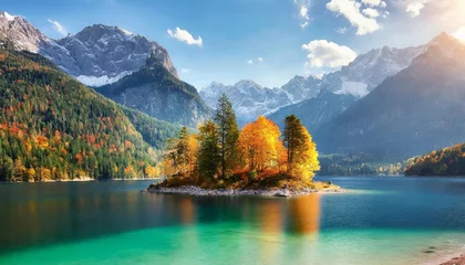 Poster an island with golden trees in the middle of colorful water of eibsee lake situated in the alps at the foot of zugspitze mount garmisch partenkirchen bavaria germany © Emanuel