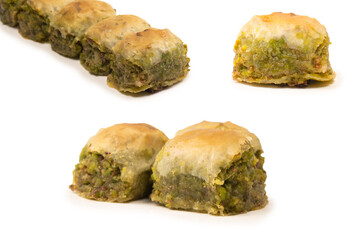 Turkish pistachio baklava isolated on white background.