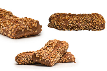 Loaf of bread with sunflower seeds isolated on a white background.
