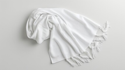 Creating a white beach towel mockup isolated on a white background in a flat lay top view style