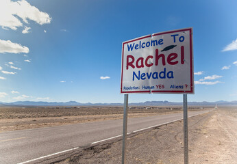 "Welcome to Rachel Nevada" sign along Nevada highway.