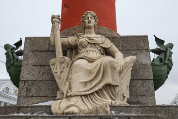 Sculpture of a woman on the Rostral column, symbolizing the Russian river on the spit of...
