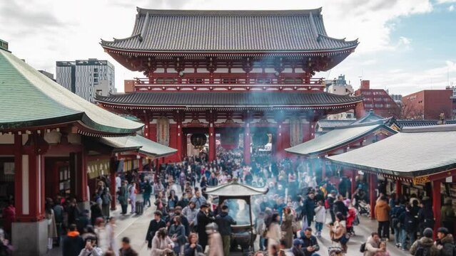 Timelapse view of crowds at the historic Senso-ji temple in Asakusa, Tokyo, Japan. 