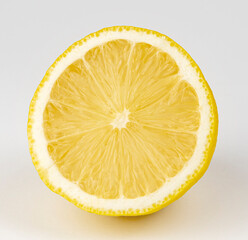 Lemon, a halved lemon with yellow flesh. The concept of citrus fruit.