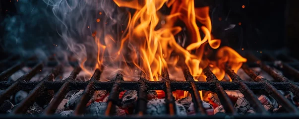 Zelfklevend Fotobehang burning charcoal burning with open fire, ready for grilling on dark background © Fajar