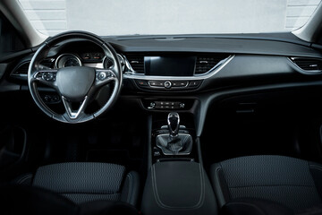 Stylish, spacious family car,. Modern car interior, black perforated leather, aluminum, details...