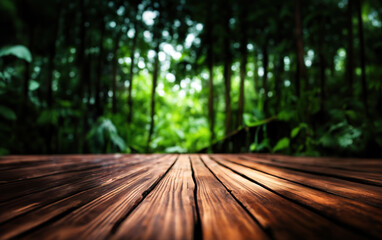 Empty rustic wood texture of old wooden tabletop, blur on green forest background Displaying layout, mounting your product, developing key visual layout.