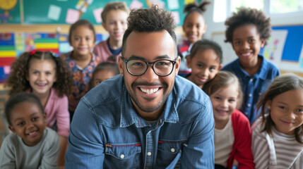 Obraz premium Enthusiastic male teacher engages with his elementary school students in a colorful and vibrant classroom setting, promoting active learning and participation.