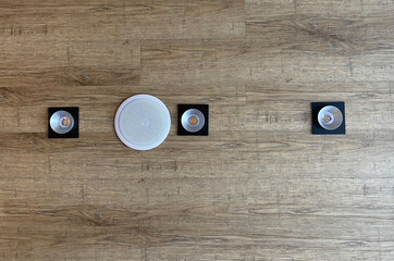 Loud speaker mounted on wooden ceiling