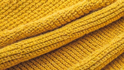 bright yellow macro photo of textured jersey and knitting of sweater or sweatshirt pattern and background for fashion warm autumn concept