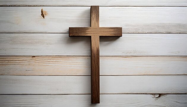 christian cross on white wooden background top view with space for text religion concept