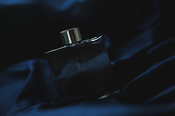 bottle of perfume on a blue background