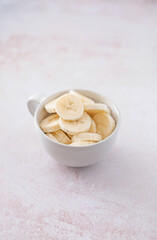 banana slices in a cup