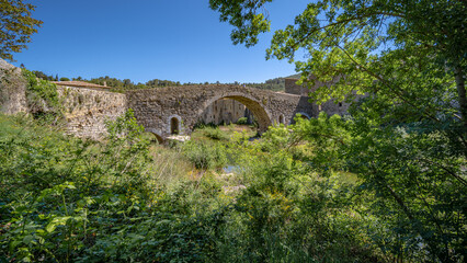 The old bridge of a Southern France village