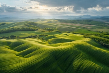 Beautiful Aerial landscape of waves hills valley in rural nature, Tuscany farmland, Italy, Europe