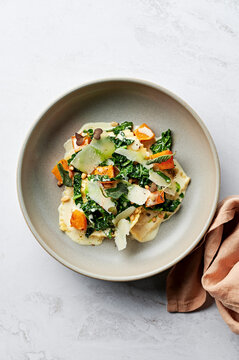 Roasted pumpkin & parmesan ravioli, cavolo nero, roasted butternut pumpkin, sage cream sauce, toasted pine nuts & shaved parmesan