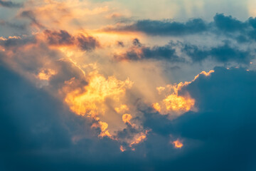 Dramatic cloudy sky background. Orange cloudy sunset sky.