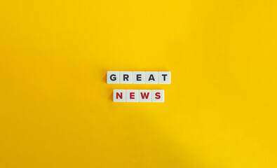 Great News Phrase. Text on Block Letter Tiles on Yellow Background. Minimalist Aesthetics.