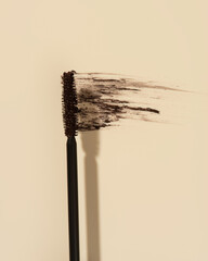 mascara on a beige background