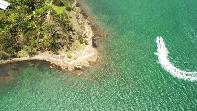 Murrays beach scenic waterfront on Lake Macquarie in aerial vertical view 4k.
