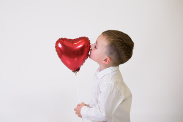 Little children with air balloons on white background. Valentine's Day Celebration