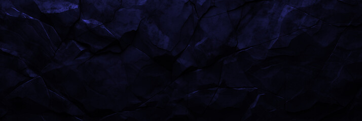 Obraz premium Wide navy stone background for banner design. Blue rock grunge texture. Mountain surface close-up cracked empty copy space