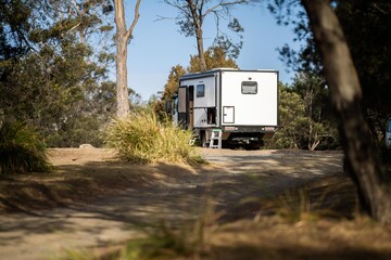camping in a tent and van in the australian bush. Caravan camping at a camp ground off grid on a...