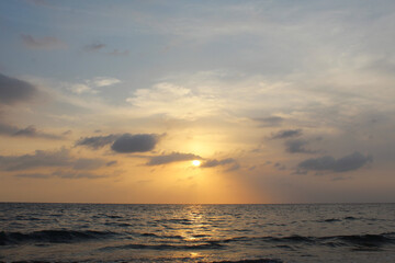 Naklejka na ściany i meble sunset at the beach