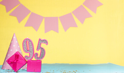 Date of birth for a girl  95. Copy space. Birthday in pink shades with a yellow background....
