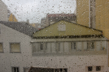 looking outside in a boring rainy day