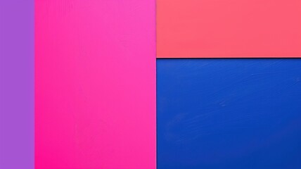 A stark color block contrast between vivid pink and deep blue sections