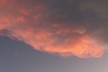 Orange Sunset background with different textures and colors in the clouds.