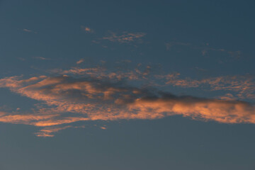 Orange Sunset background with different textures and colors in the clouds.