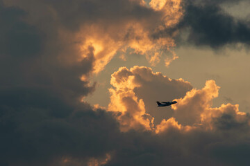 Orange Sunset background with different textures and colors in the clouds.
